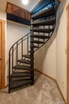 Spiral Staircase leading to lower bedrooms